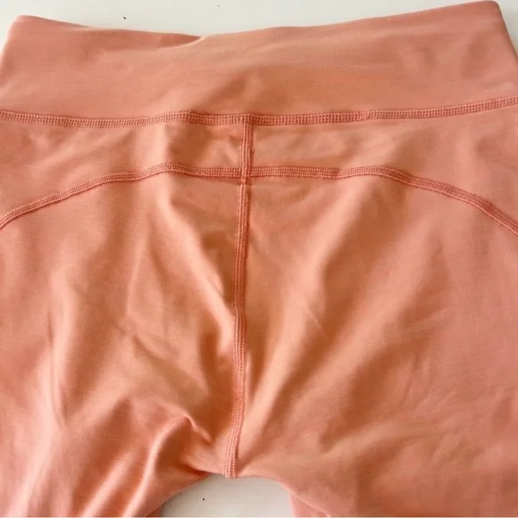 Outdoor Voices Tech Sweat Biker Shorts in Heathered Orange Peach - Picture 7 of 16